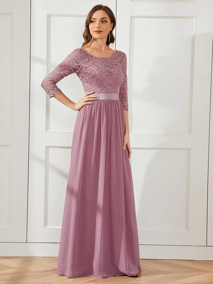 Robe de soirée en dentelle transparente au sol avec demi-manches