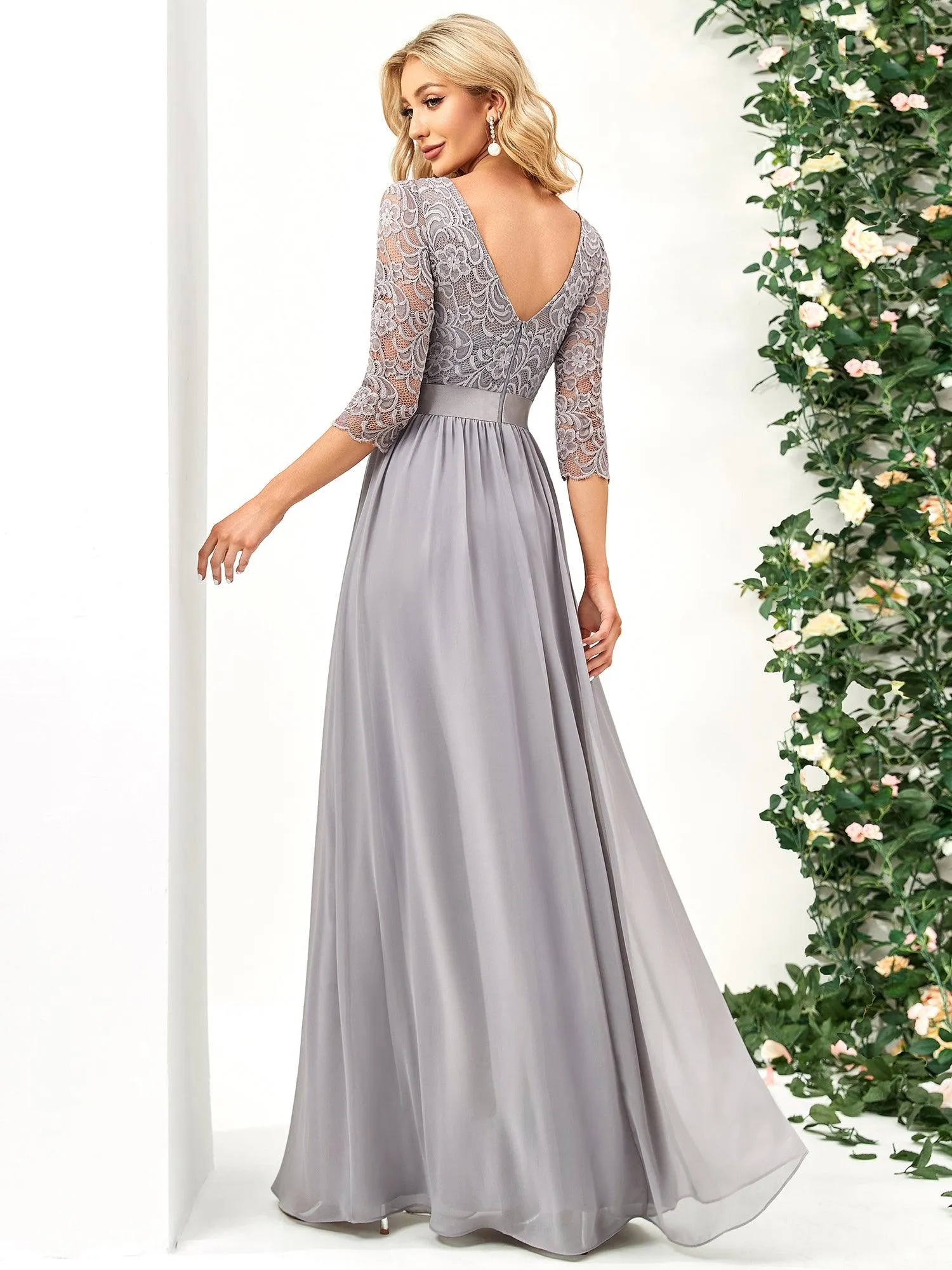 Robe de soirée en dentelle transparente au sol avec demi-manches