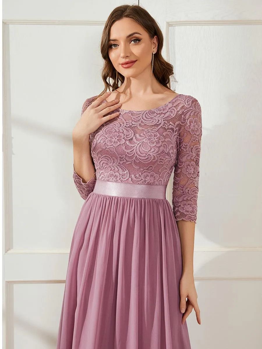 Robe de soirée en dentelle transparente au sol avec demi-manches
