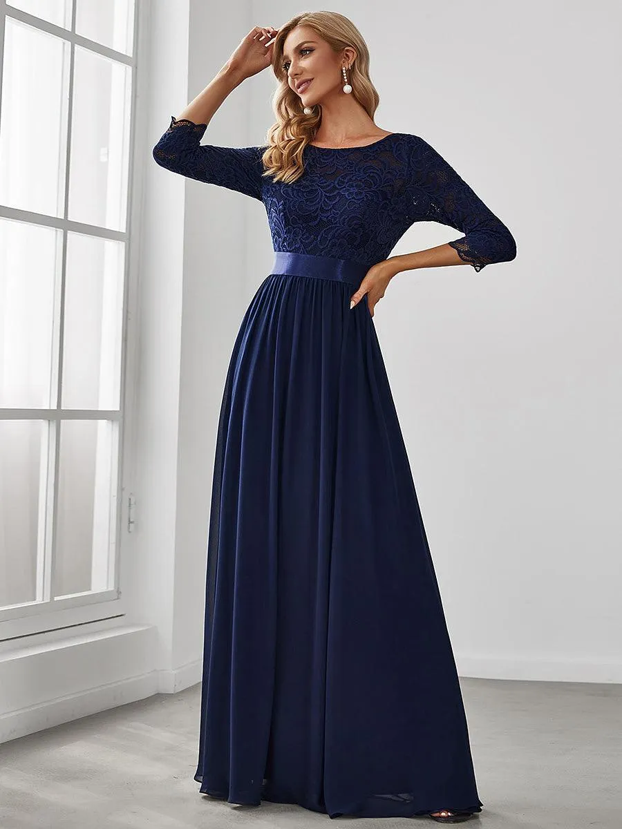 Robe de soirée en dentelle transparente au sol avec demi-manches