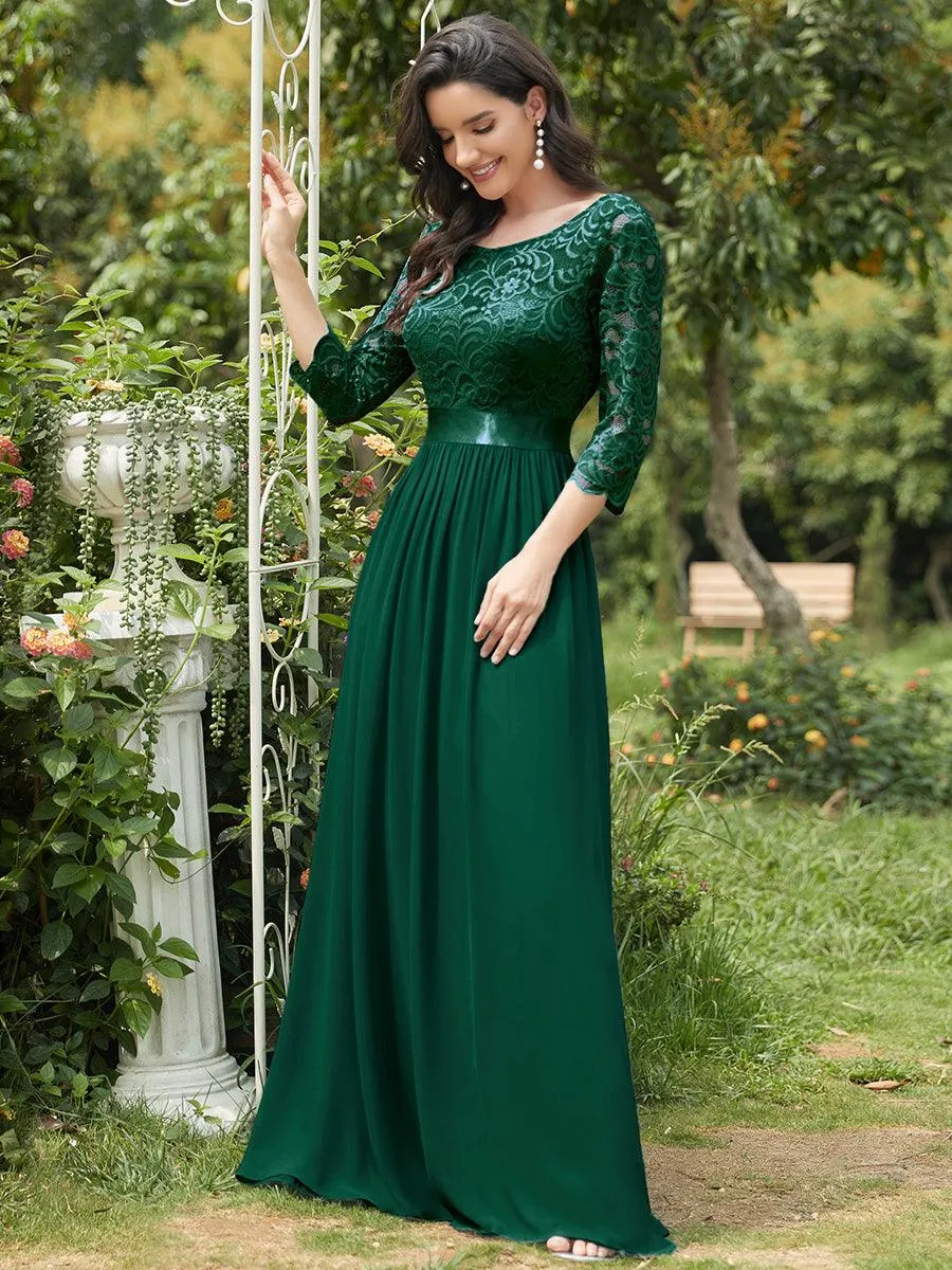 Robe de soirée en dentelle transparente au sol avec demi-manches