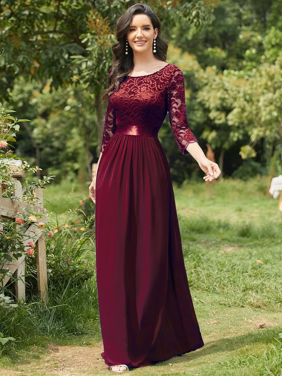 Robe de soirée en dentelle transparente au sol avec demi-manches