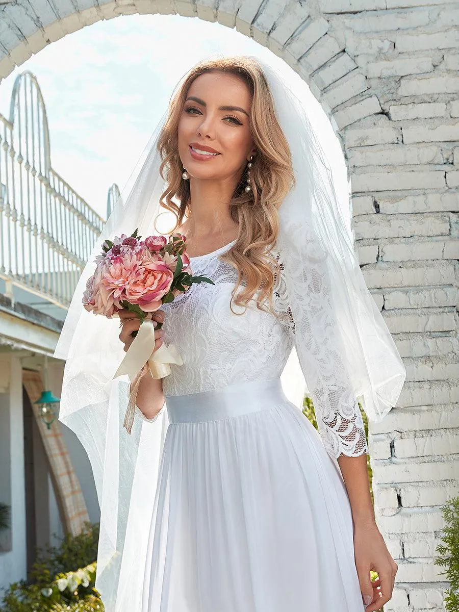 Robe de soirée en dentelle transparente au sol avec demi-manches