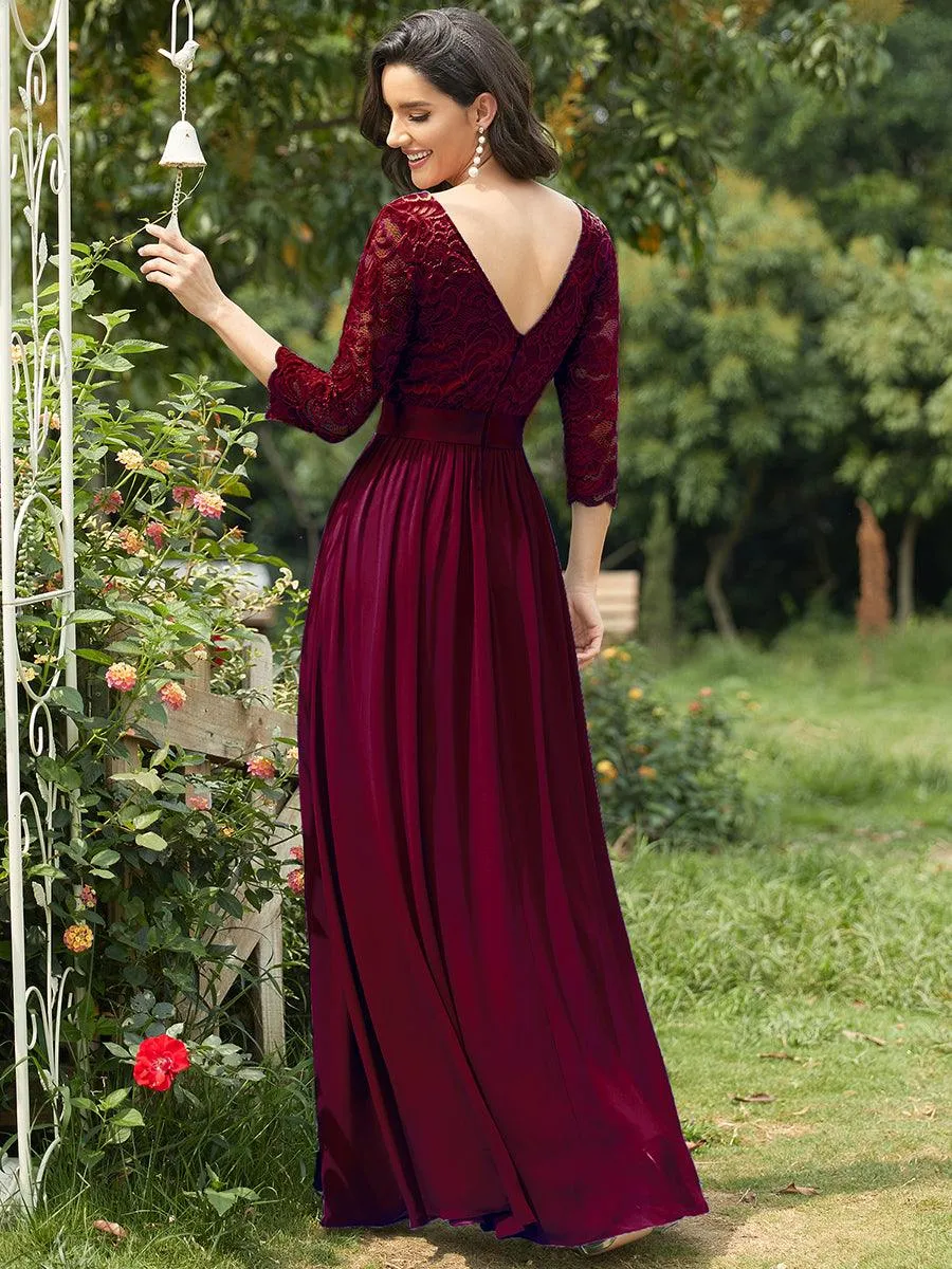 Robe de soirée en dentelle transparente au sol avec demi-manches