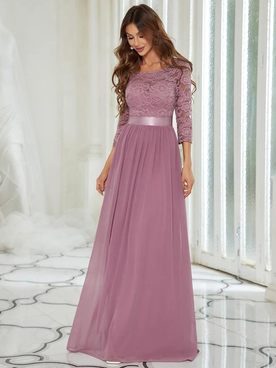 Robe de soirée en dentelle transparente au sol avec demi-manches
