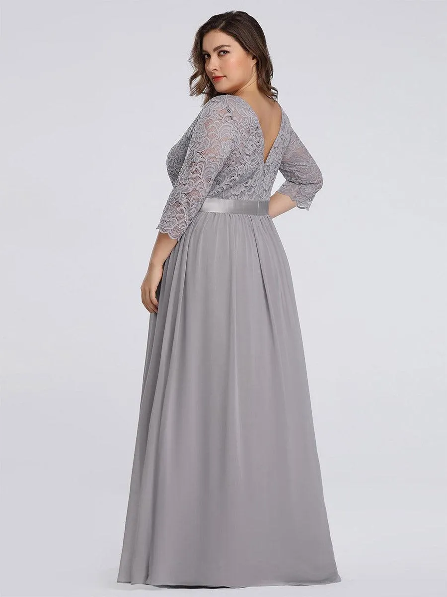 Robe de soirée en dentelle transparente au sol avec demi-manches