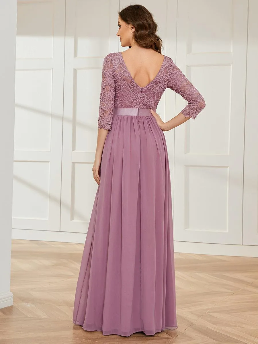 Robe de soirée en dentelle transparente au sol avec demi-manches