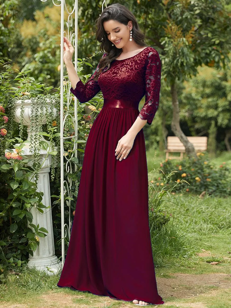 Robe de soirée en dentelle transparente au sol avec demi-manches