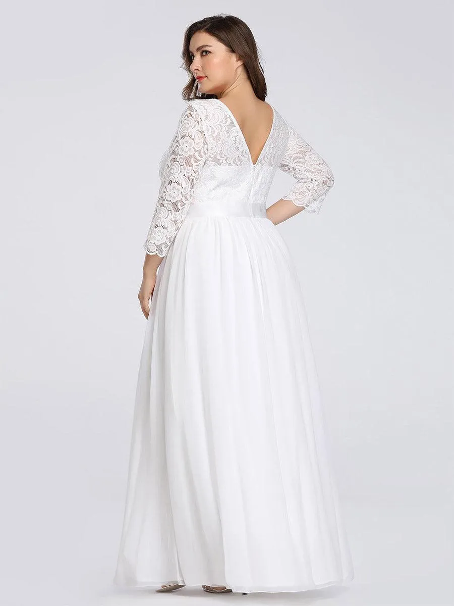 Robe de soirée en dentelle transparente au sol avec demi-manches
