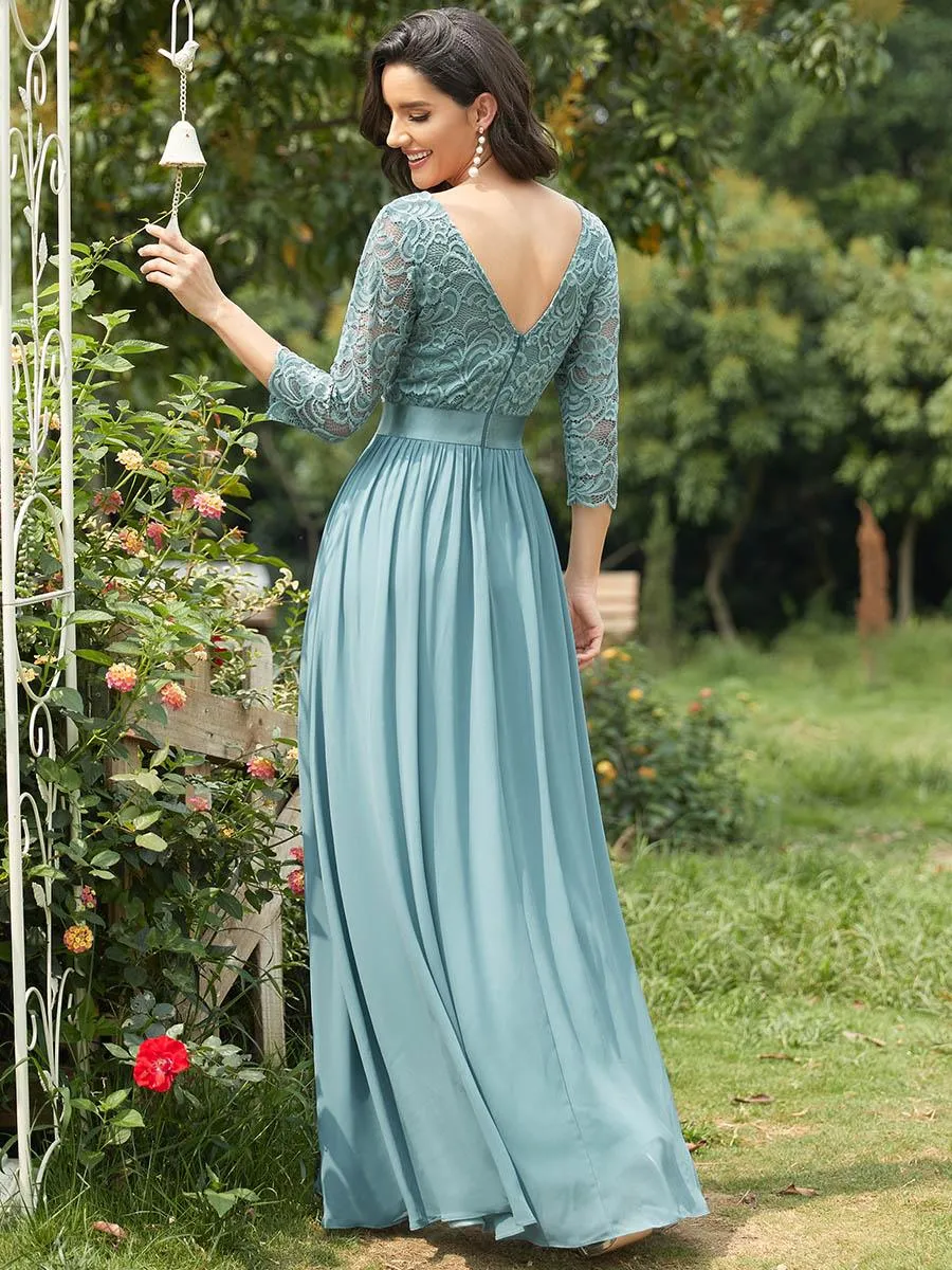 Robe de soirée en dentelle transparente au sol avec demi-manches