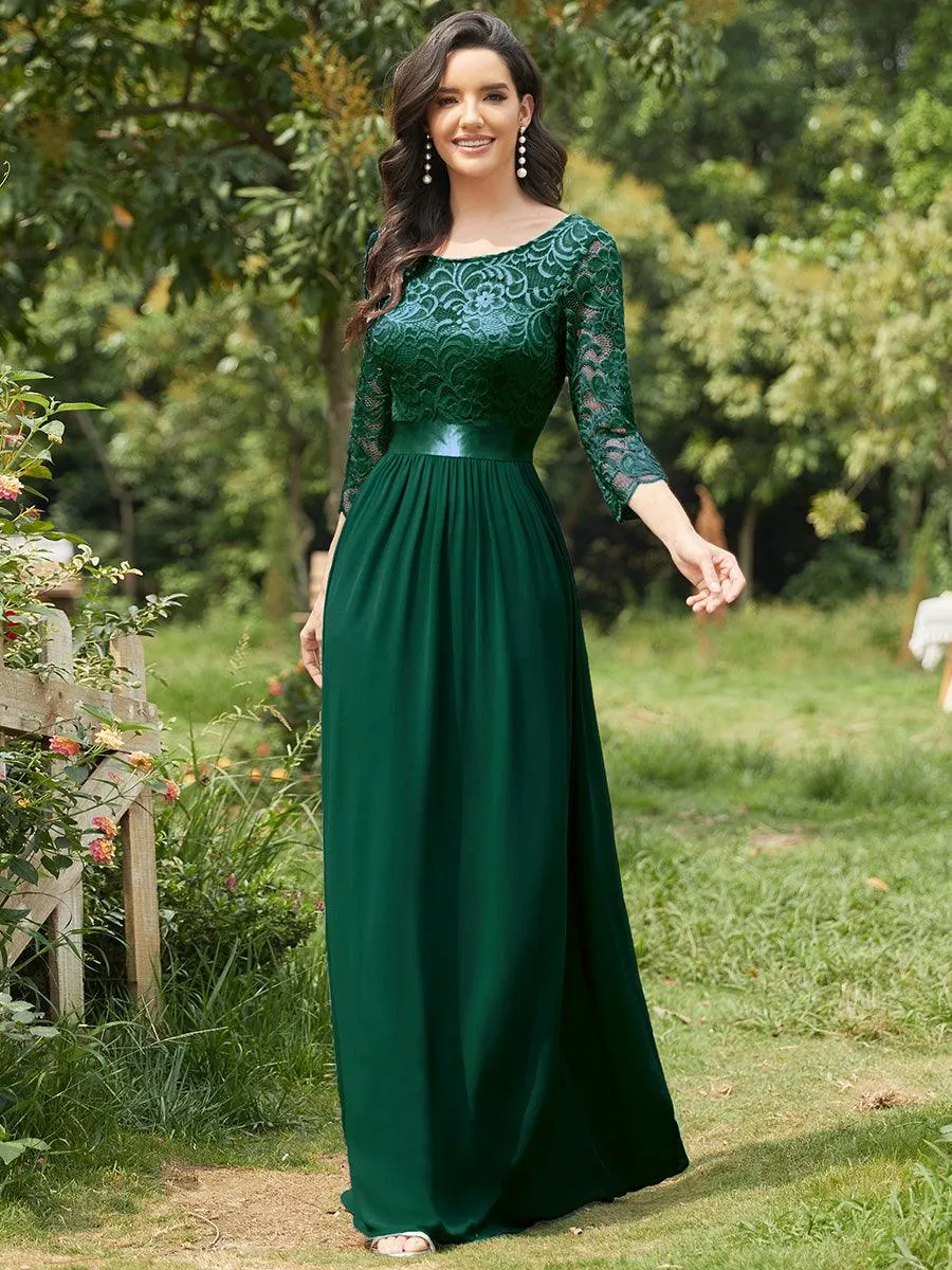 Robe de soirée en dentelle transparente au sol avec demi-manches