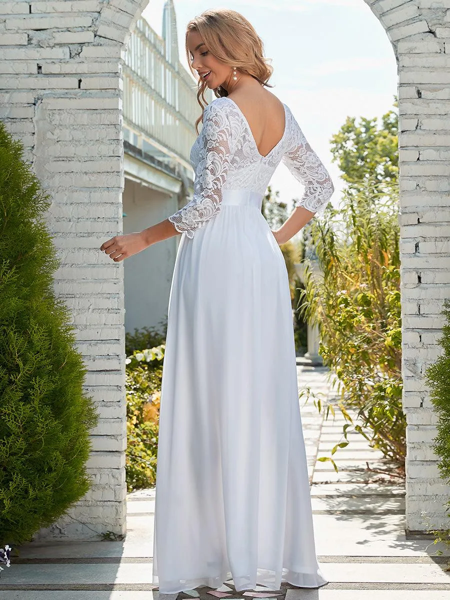 Robe de soirée en dentelle transparente au sol avec demi-manches
