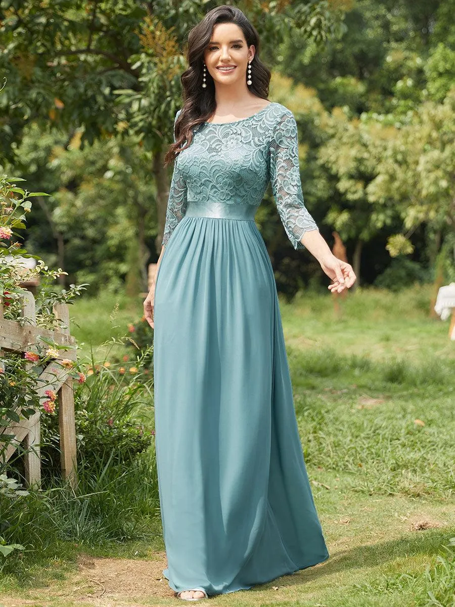 Robe de soirée en dentelle transparente au sol avec demi-manches