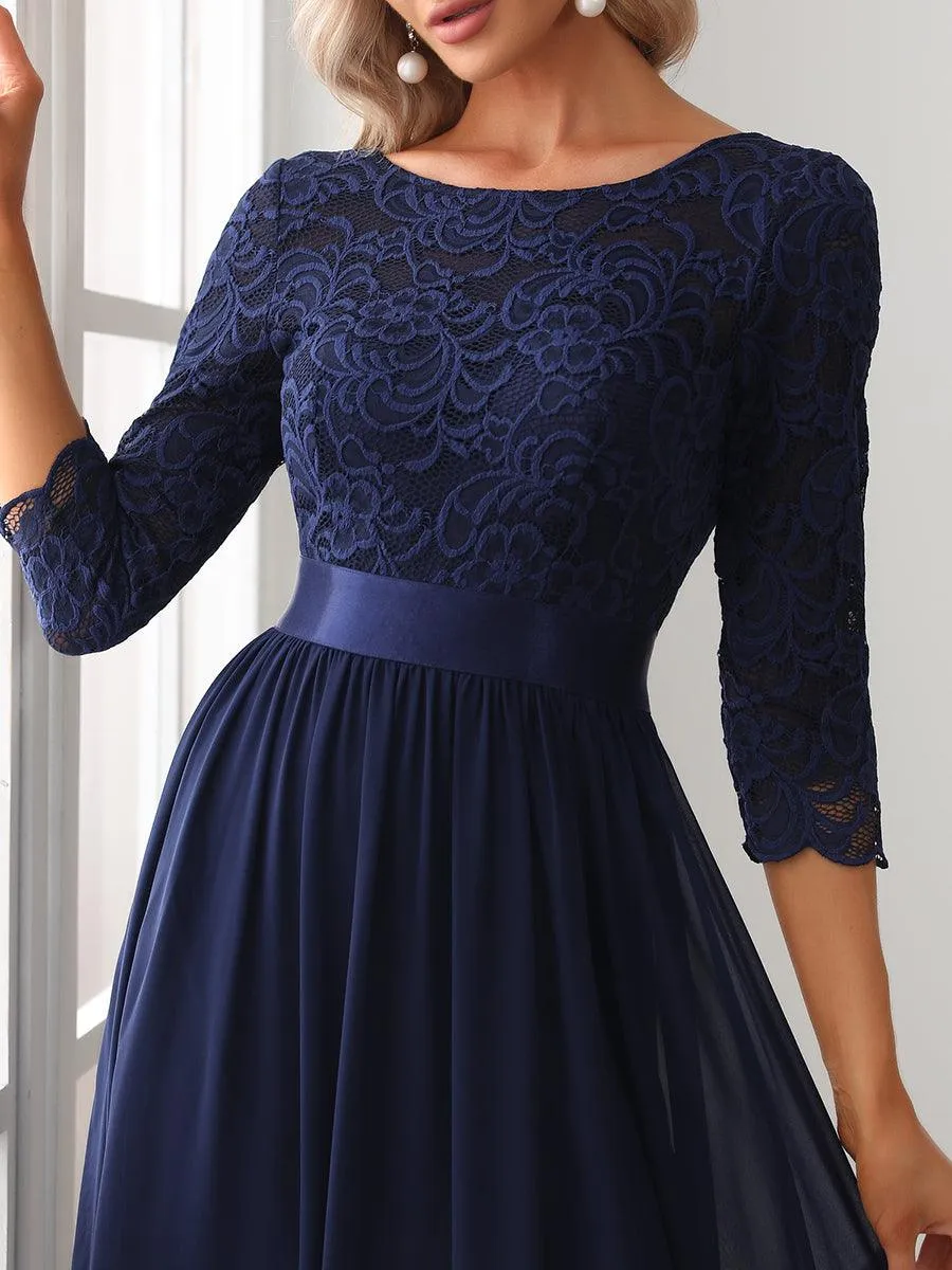 Robe de soirée en dentelle transparente au sol avec demi-manches