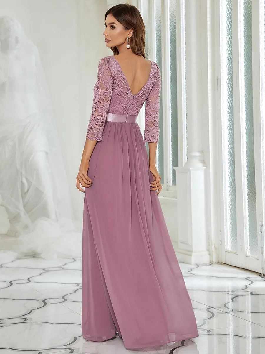 Robe de soirée en dentelle transparente au sol avec demi-manches