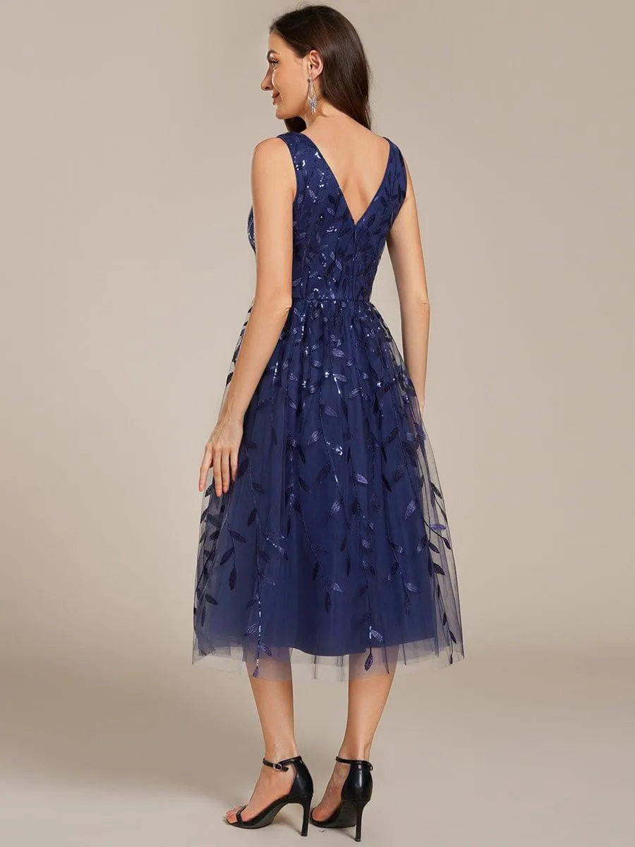 Robe d'invité de mariage mi-longue trapèze à col en V et paillettes avec sans manches