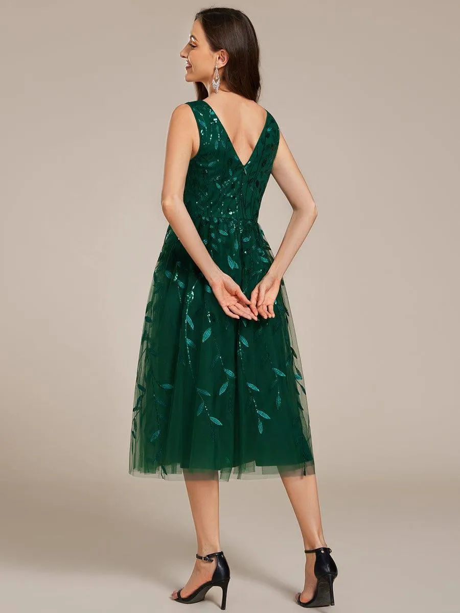 Robe d'invité de mariage mi-longue trapèze à col en V et paillettes avec sans manches