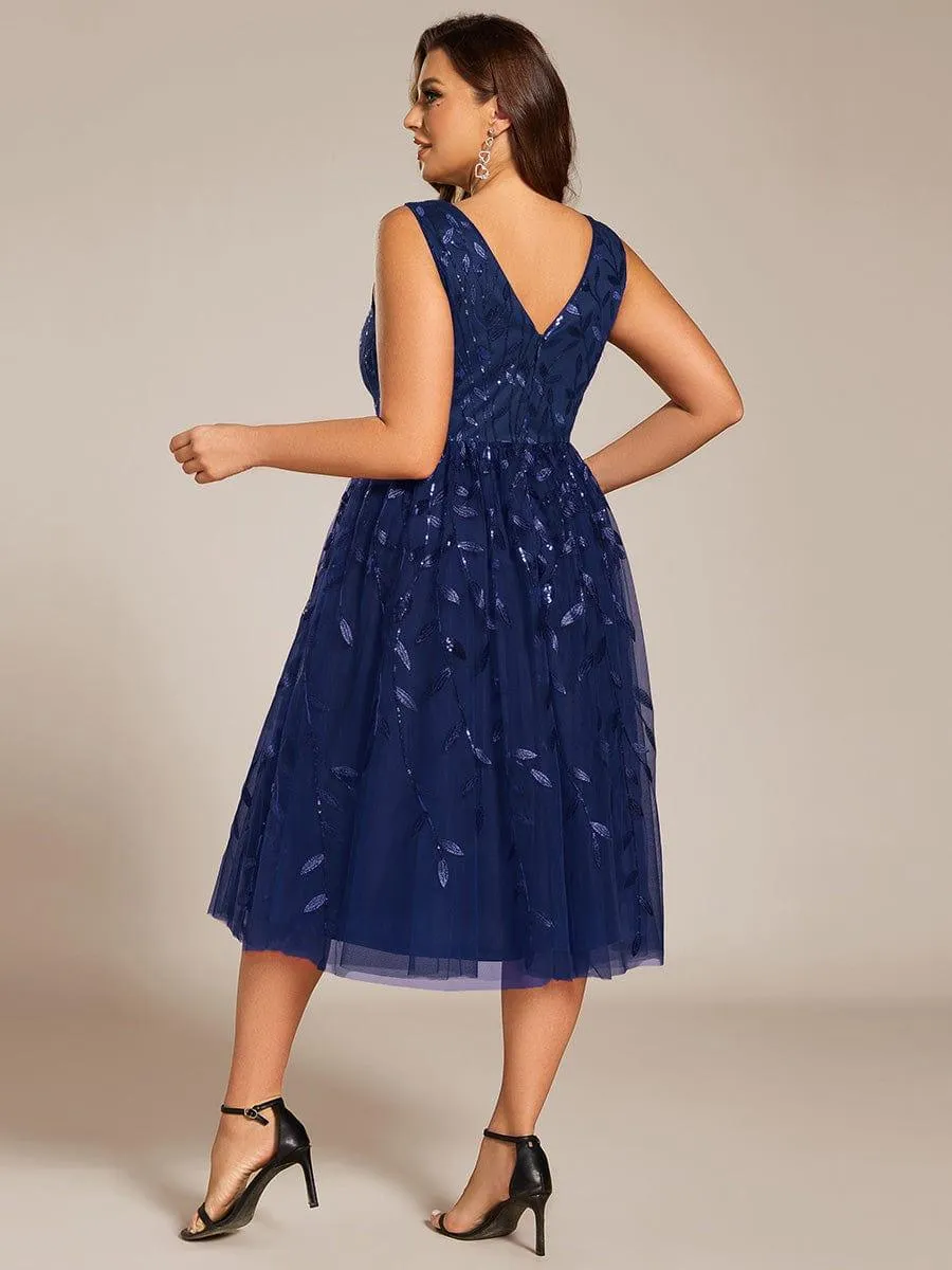 Robe d'invité de mariage mi-longue trapèze à col en V et paillettes avec sans manches
