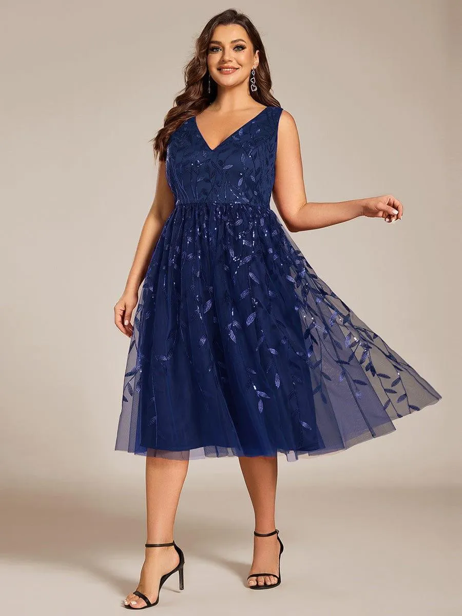 Robe d'invité de mariage mi-longue trapèze à col en V et paillettes avec sans manches
