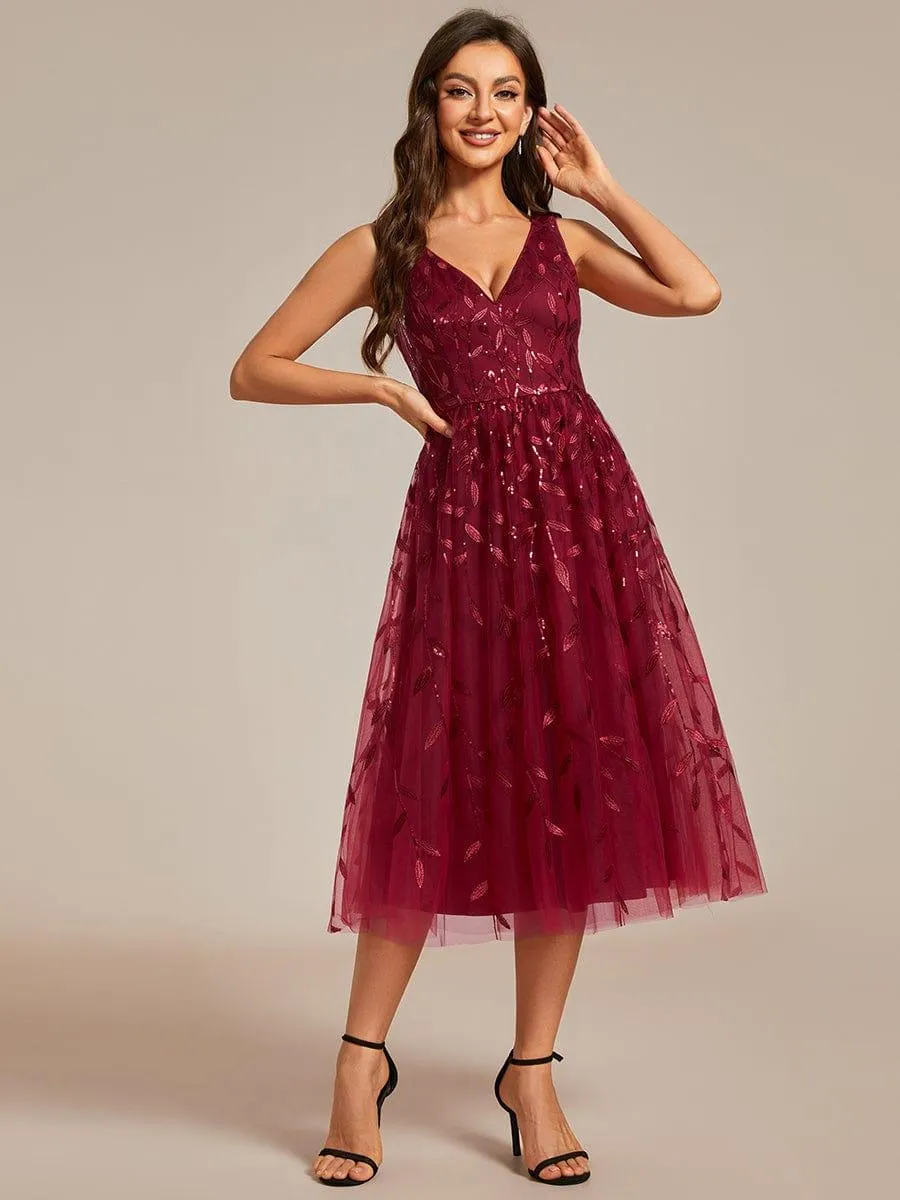 Robe d'invité de mariage mi-longue trapèze à col en V et paillettes avec sans manches