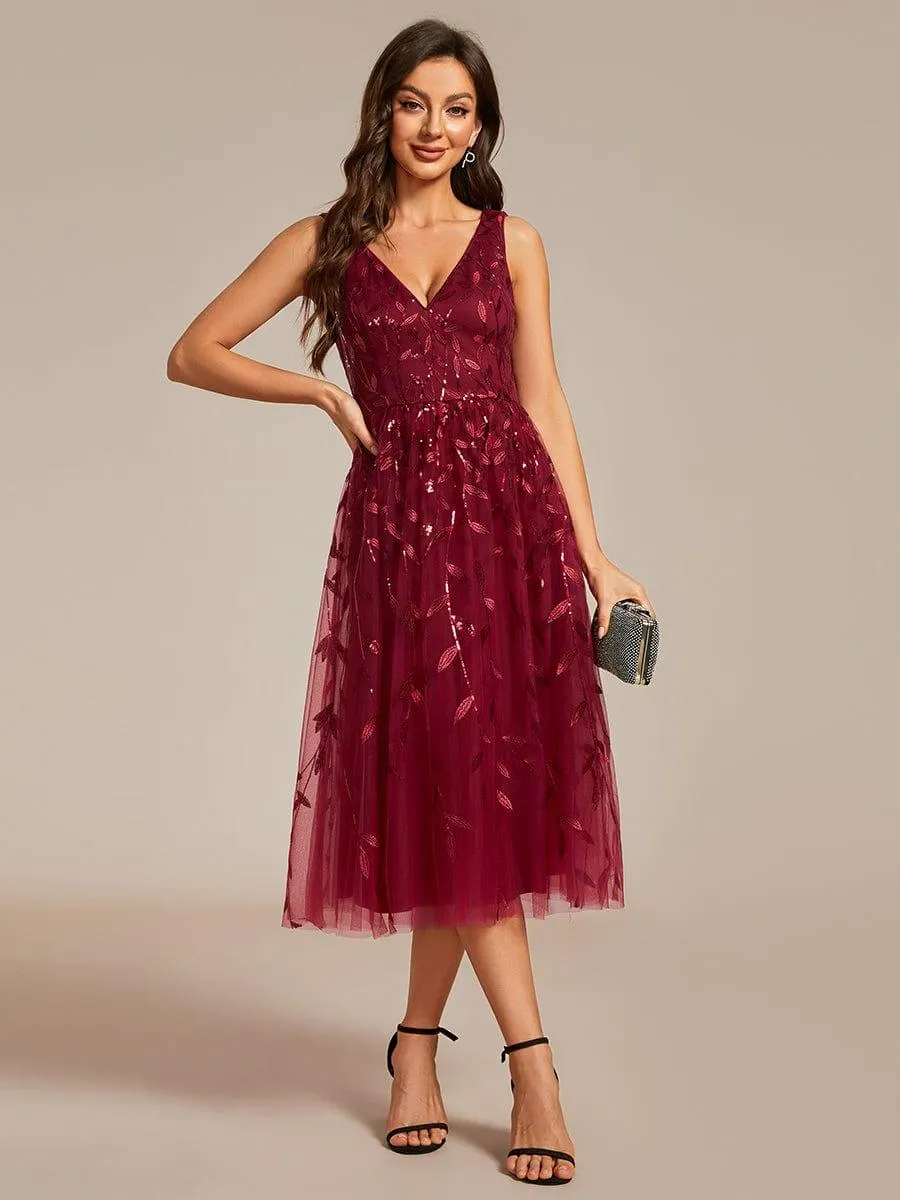 Robe d'invité de mariage mi-longue trapèze à col en V et paillettes avec sans manches